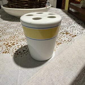 White and Yellow Toothbrush Holder